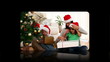 Hand pressing and scrolling through christmas videos