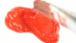 Paintbrush and red paint color