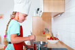 girl cooking in modern kitchen