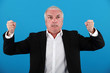 Angry grey-haired businessman