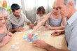 Family completing jigsaw together