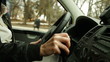 Woman behind the wheel in urban driving situations