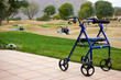 Walker Outdoors on Patio With Golf Course In Background