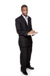 writing on clipboard - African American businessman