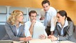 Group of business people meeting around table