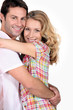 smiling couple hugging