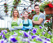 Florists working at flower shop.