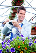 Florist man working with flowers.