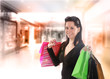 Shopping young woman in the shopping mall.