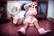 young housewife with washing machine and towels. young housewife with washing machine and towels.