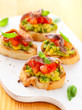 crostini with avocado,tomato and anchovy crostini with avocado,tomato and anchovy