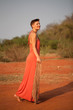 Beautiful girl dressed  terracotta dress