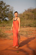 Beautiful girl dressed  terracotta dress