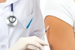 Photo: Doctor making insulin or flu vaccination Doctor making insulin or flu vaccination