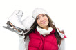 Pretty woman with ice skates winter
