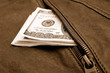 Photo: Dollars in a pocket Dollars in a pocket