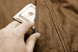 Photo: Dollars in a pocket Dollars in a pocket