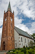 Old church made from red brick in summer