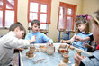 Photo: children shaping clay in pottery studio children shaping clay in pottery studio