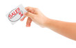 hand holding card with the word Sale