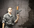 young soldier aiming