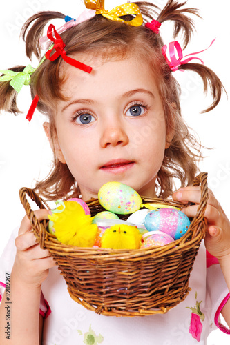 Photo: Girl holding Easter eggs Girl holding Easter eggs