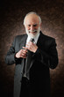 a man fixes the tie