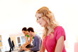 Beautiful blond girl working on laptop computer