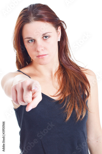 Photo: Young woman pointing at you Young woman pointing at you