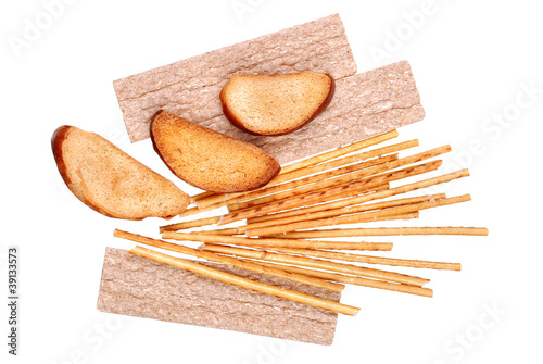 Photo: rusk and salted breadsticks isolated rusk and salted breadsticks isolated