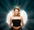 Beautiful young woman posing as innocent angel Beautiful young woman posing as innocent angel