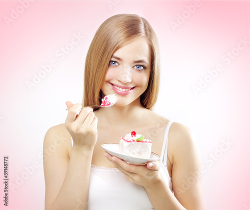 Photo: girl eating cake girl eating cake