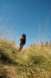 Lonely trekking woman in the nature