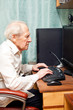 Old Man Working On Computer