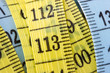 yellow and blue measuring tape