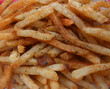 Closeup of french fries with fresh herbs