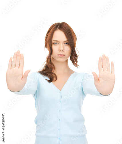 Photo: woman making stop gesture woman making stop gesture