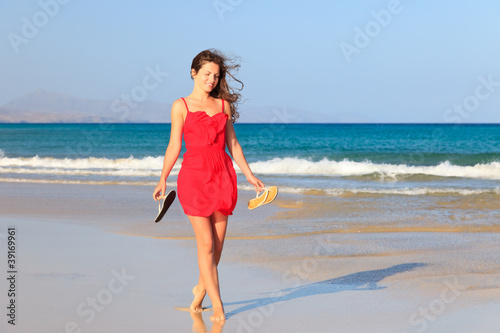 Photo: Young woman on a beach Young woman on a beach