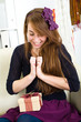Beautiful young girl receives a gift Beautiful young girl receives a gift