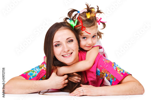 Foto: Girl embracing mother Girl embracing mother