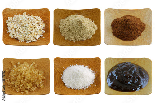Photo: Facial mask and body scrub - exfoliating powder on a wooden bowl Facial mask and body scrub - exfoliating powder on a wooden bowl