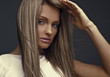 Young beautiful woman studio isolated.