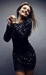Young sensual & beauty woman in a fashionable dress.