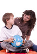 Little schoolboy and mother with globe