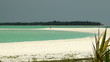 wild beach with white coral sand