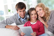 Family listening to music with tablet