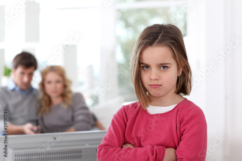 Photo: Upset little girl prohibited to watch tv Upset little girl prohibited to watch tv