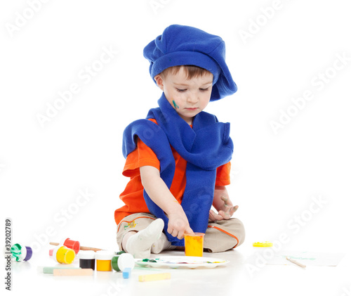 Photo: young artist child with paints young artist child with paints