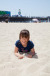 Little Girl Lying on the Beach