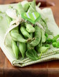 pods of green peas on a wooden table, rustic style pods of green peas on a wooden table, rustic style